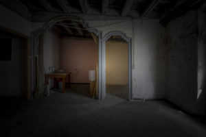 interior of an apartment with abandoned walls, ceilings and floors in the center of a European city interior of an apartment with abandoned walls, ceilings and floors in the center of a European city